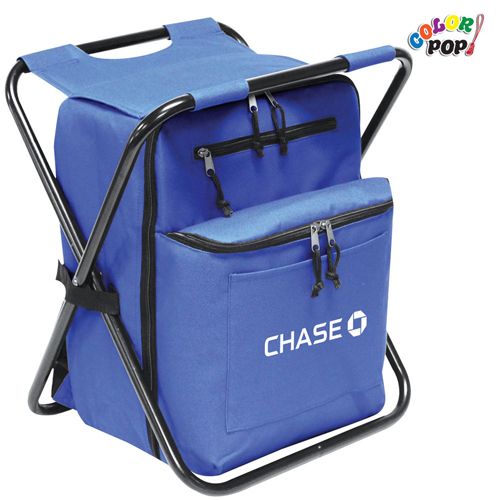 a blue cooler bag sitting on top of a black chair with the word chase written on it