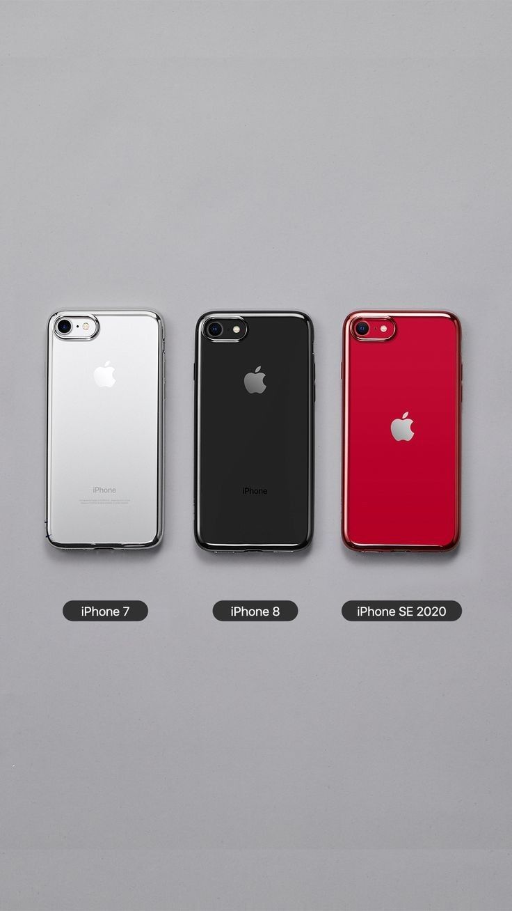 four different colored iphones lined up next to each other on a gray surface with black and white lettering