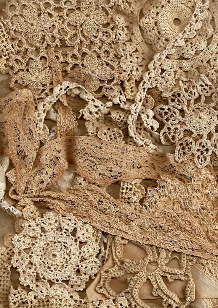 an old piece of cloth with lace on it