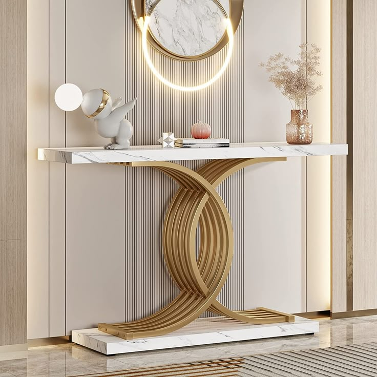 a console table with a marble top and gold accents in a modern living room setting