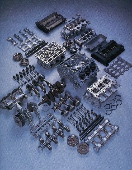 an assortment of engine parts are shown in this image