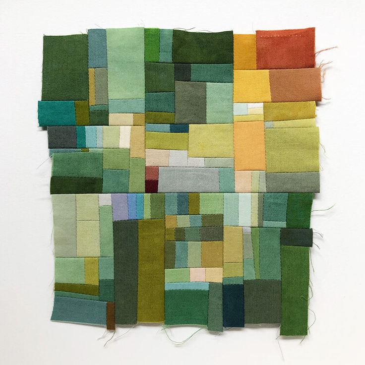 a piece of art made out of different colored squares