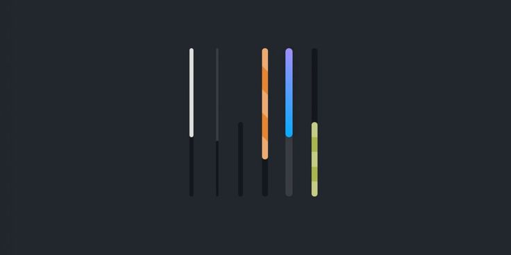 three different colored pencils sitting next to each other on a black surface with the same color