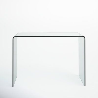 a glass and metal table against a white background with no one around it or someone else