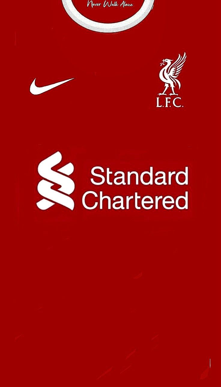 the liverpool united shirt is red with white letters and a black nike logo on it