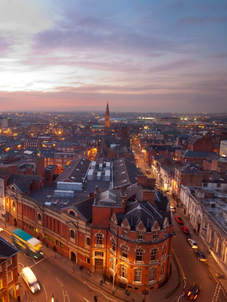 an aerial view of a city at night