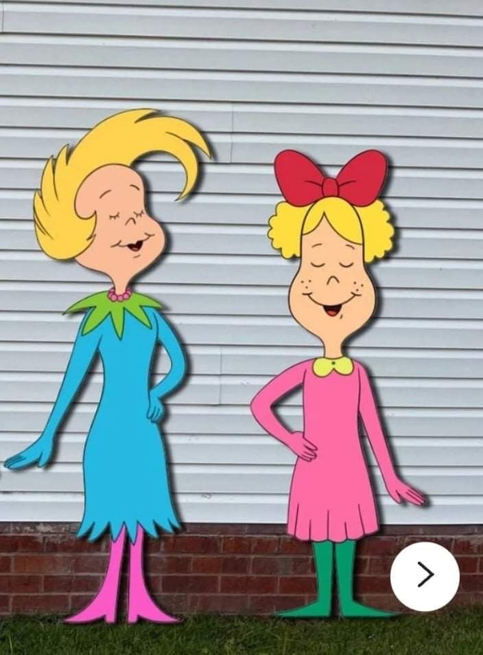 two cartoon characters are standing in front of a building and one is wearing a red bow