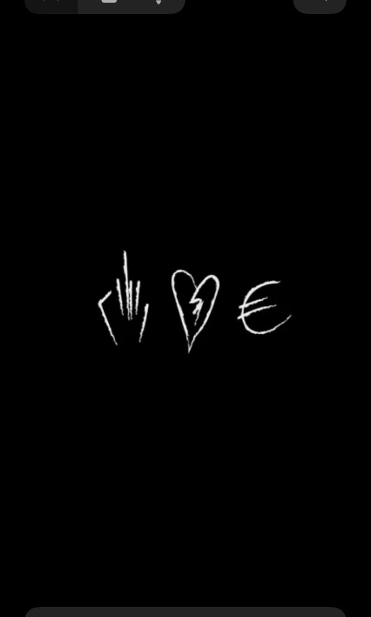 the word love is written in white chalk on a black background with an arrow and heart