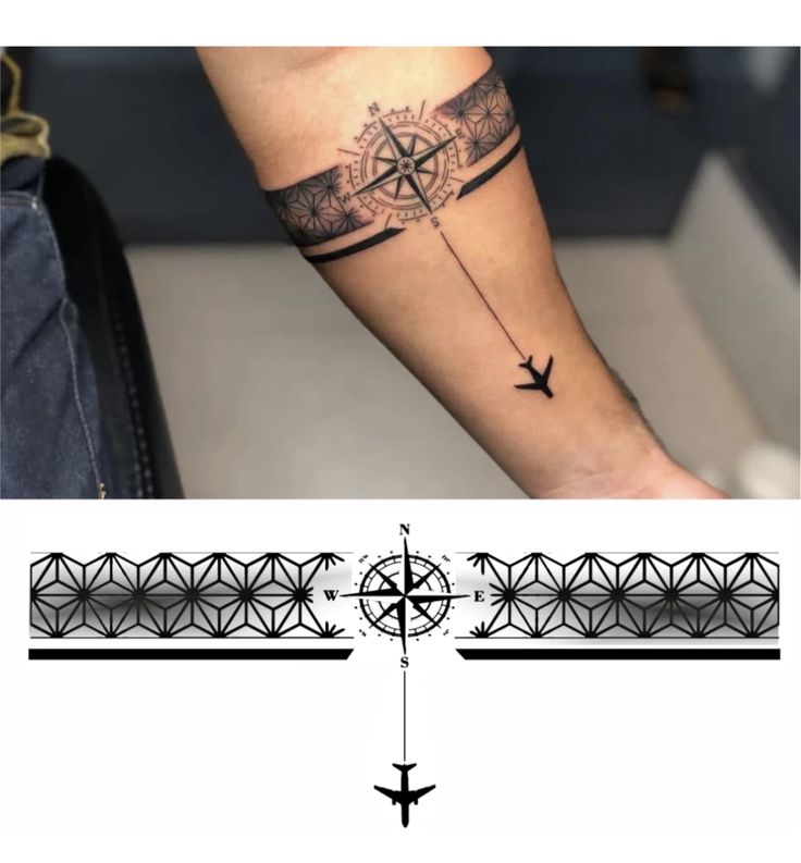 a black and white photo with an airplane tattoo on the arm, next to a cross