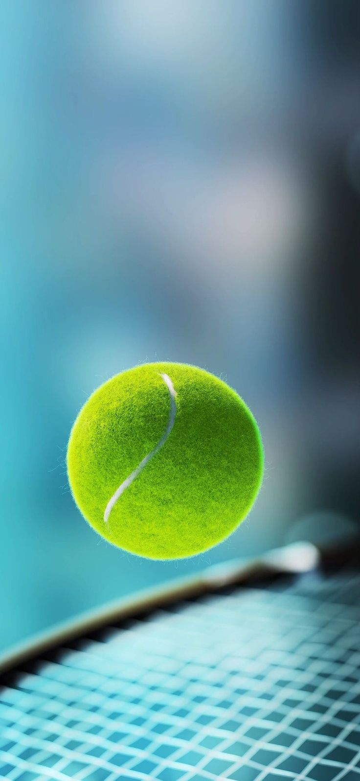 a tennis racquet hitting a tennis ball with it's back end in the air