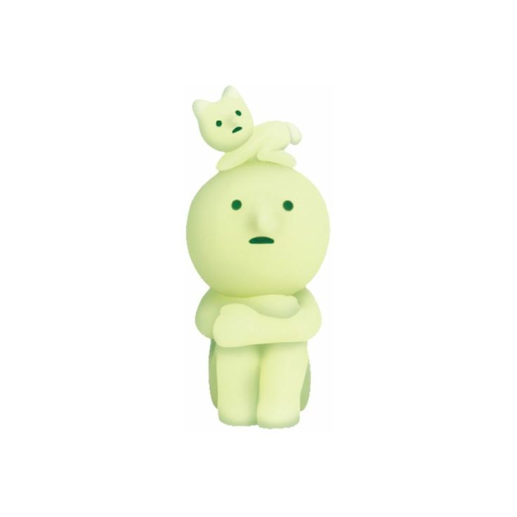 a small toy with a cat on top of it's head in front of a white background