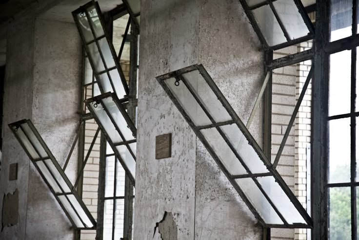 an old abandoned building with broken windows