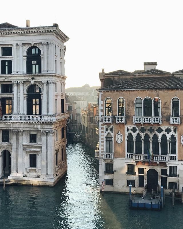 an old building next to a canal in venice