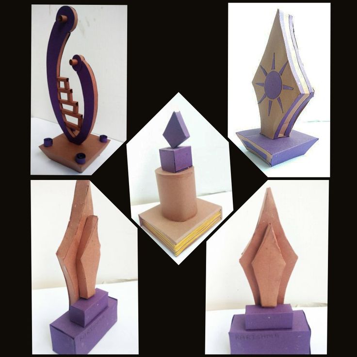 four different angles of an origami sculpture with geometric shapes and colors on them