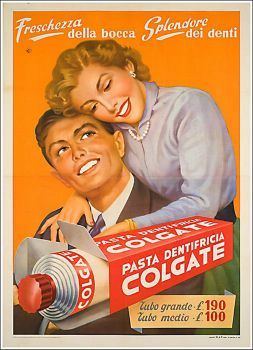 an advertisement for colgate toothpaste with a man holding a woman's head