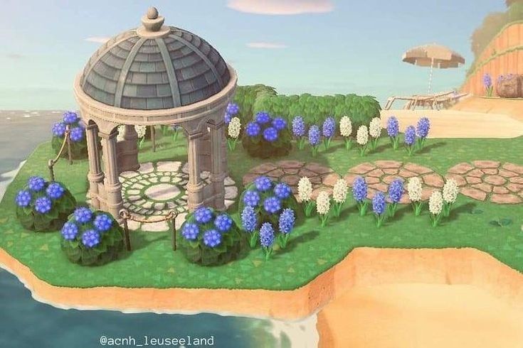 an island with blue flowers and a gazebo