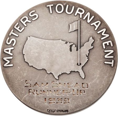 a silver coin with an american flag and the words masters tournament on it's side