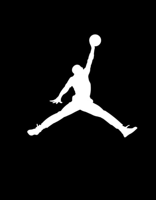 a black and white silhouette of a basketball player