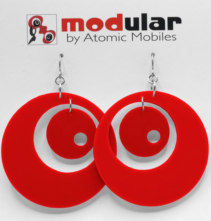 "Modern art earrings inspired by mid century modern retro design and my hanging art mobiles. Wearable art! Custom handmade by me in my studio in Los Angeles. No-worry, no-pain hypo-allergenic titanium ear wire, stainless steel rings, and adorably mod acrylic dangle shapes. Show your mid century modern style with these modern earrings! Arrives in lovely gift box with ribbon and includes free 2020 Atomic Mobiles Art Catalog. CHOOSE FROM 2 SIZES: Medium: 3\"h x 2 1/4\" w Small: 2 1/8\"h x 1 1/2\"w Mobiles Art, Kinetic Art Sculpture, Mod Earrings, Atomic Retro, Clear Earrings, Acrylic Shapes, Kinetic Sculpture, Art Earrings, Mod Fashion