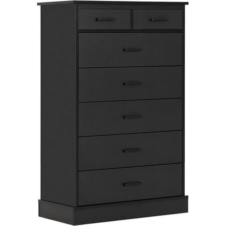 a black chest of drawers with five drawers