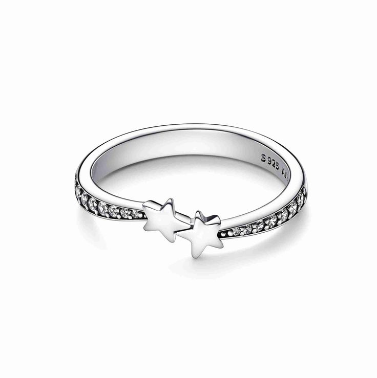 Two shining stars meet on our new Shooting Stars Sparkling Ring design, which symbolizes the power of togetherness and the magic of starry night skies filled with wonder. Crafted from sterling silver, this stackable ring is set with pavé cubic zirconia around the band, as if the stars are leaving a twinkling trail behind them. Gift this special piece as a symbol of special connections, or style it yourself as a reminder of how wonderful you are. Gold Armband, Pandora Rings, Sparkling Rings, Diamond Star, Star Ring, Stackable Ring, Shooting Stars, Ring Size Guide, Jewelry Rings Engagement