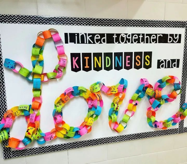 a bulletin board with the word love spelled out in different colors and letters on it