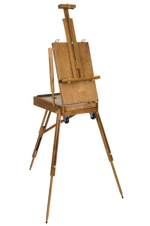 a wooden easel sitting on top of a white floor