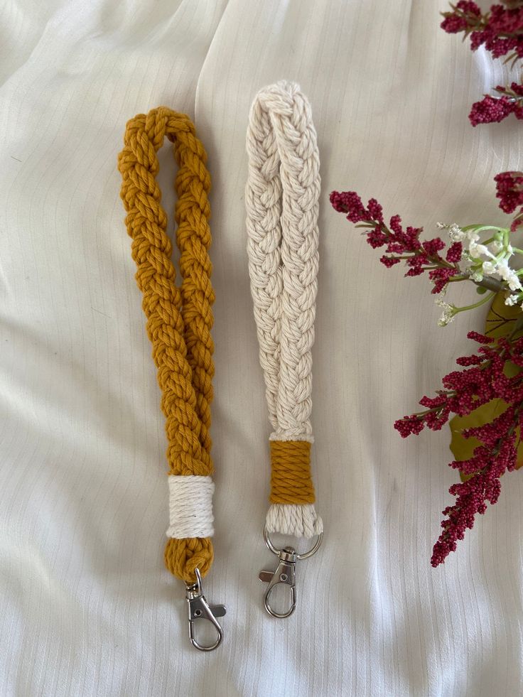 This wrist keychain (hand strap) is hand woven using natural 100% cotton rope. It is ideal to embellish your key ring or even to be attached on bags, cases, suitcases, etc. It is practical for holding your keys on your wrist and finding them easily without having to look everywhere. The color choices (mustard yellow, pistachio green, burgundy red and black) are attractive and trendy. The silver-colored metal clip is of superior quality and non-oxidizing. *Delivery in a large recycled paper envel Wrist Keychain, Strap Keychain, Paper Envelope, Pistachio Green, Hand Strap, Canada Post, Paper Envelopes, Cotton Rope, Suitcases