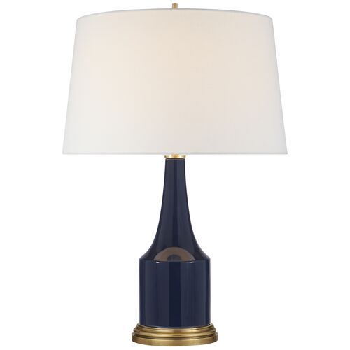 a blue table lamp with a white shade