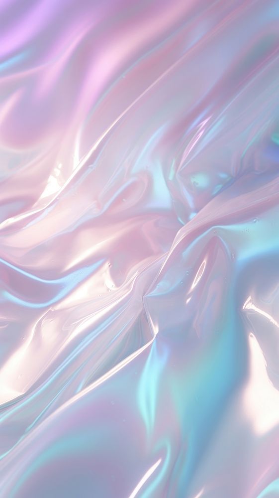 an abstract photo of blue, pink and purple material with some folds in the background