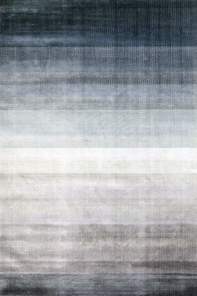 an abstract rug with blue, grey and white colors