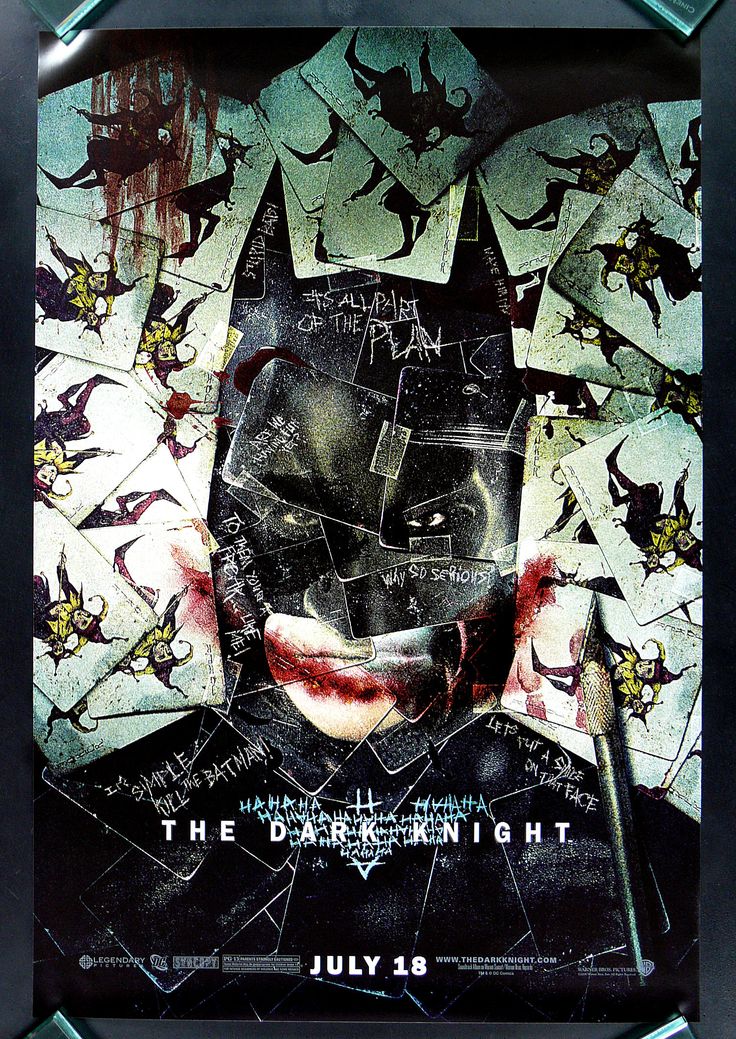 the dark knight movie poster with batman's face in torn up paper and words on it