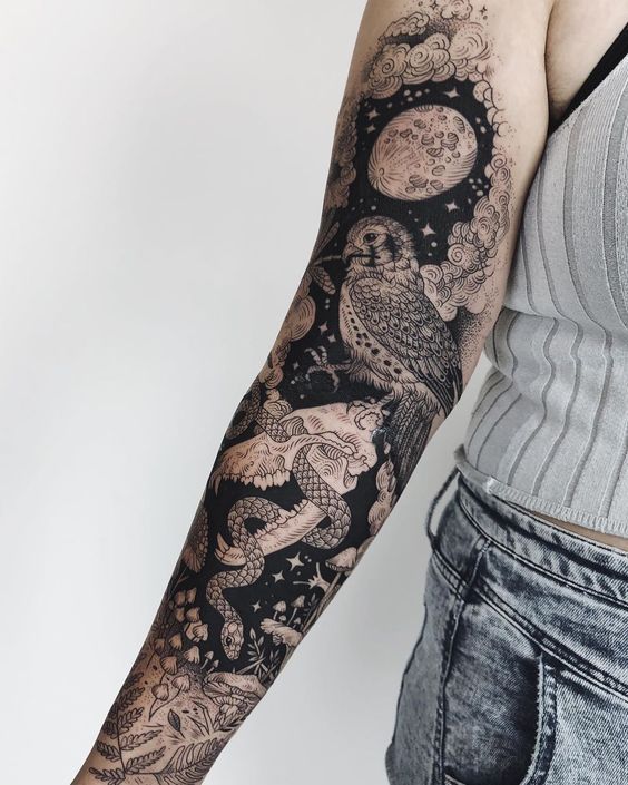 a person with a tattoo on their arm