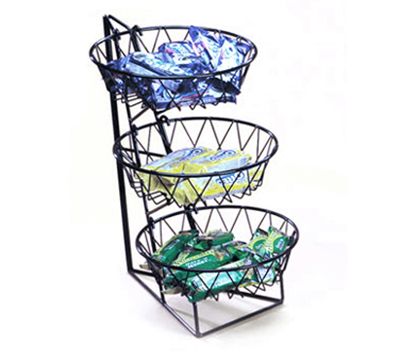 three tiered wire basket with snacks in it