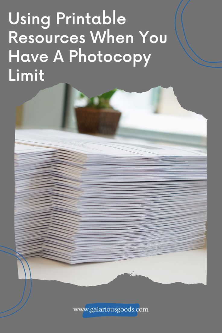 a stack of papers sitting on top of a table