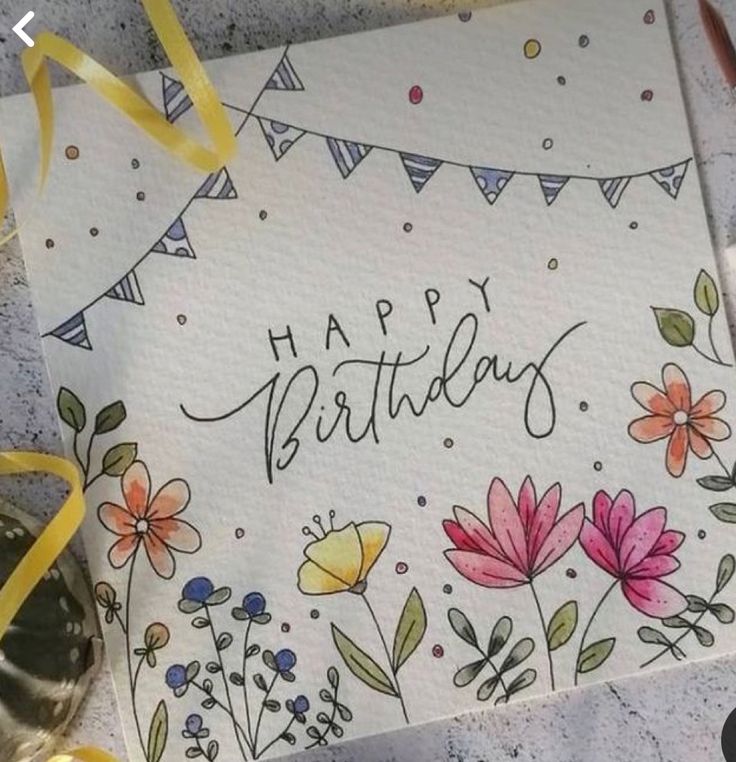 a happy birthday card with flowers and buntings on it, surrounded by confetti