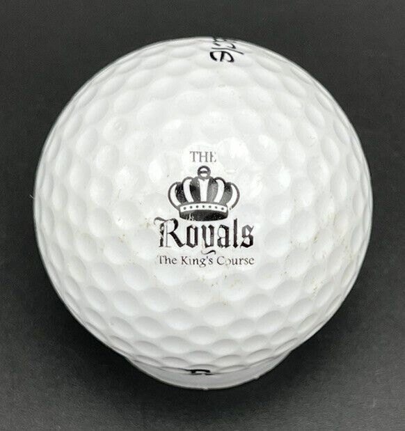 a white golf ball with the royal's logo on it