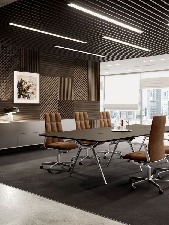 an empty conference room with brown chairs and a black table in front of a large window