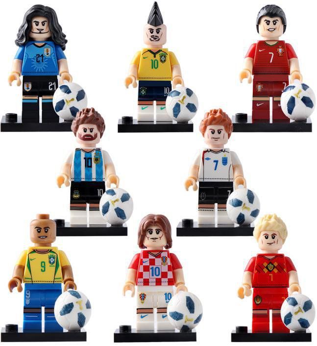 six lego people are holding soccer balls in their hands