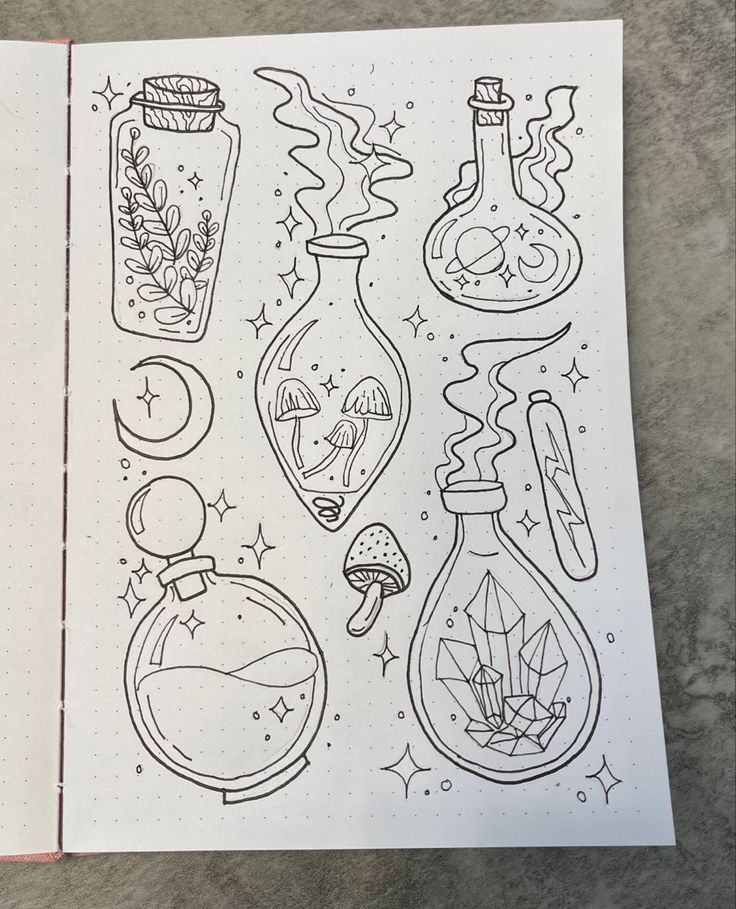 an open notebook with doodles and drawings on the pages showing different things in bottles