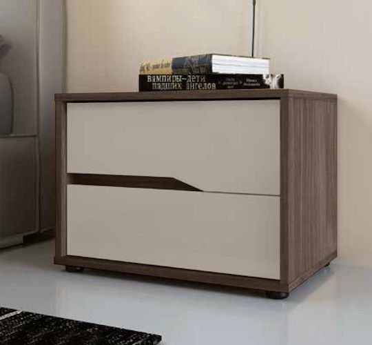 a white and brown nightstand with books on top