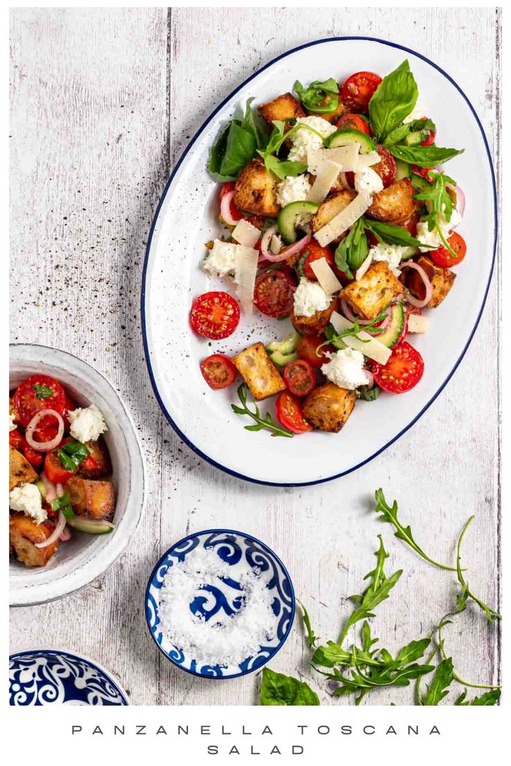 Panzanella toscana salad on a large white enamel serving dish, surrounded by a bowl of salad, salt and rocket leaves. Tuscan Salad, Italian Bread Salad, Fresh Tomato Pasta, Italian Recipes Easy, Bread Salad, Toasted Bread, Pasta Salad Italian, Stale Bread, Best Salad Recipes