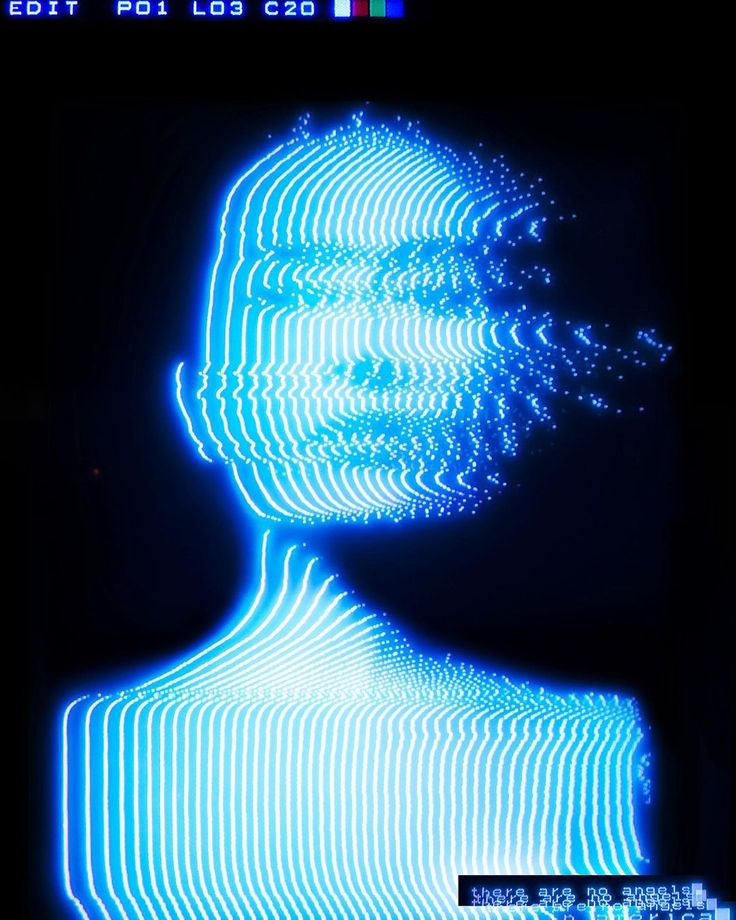 a man's face is projected on a screen in the dark with blue and white lines