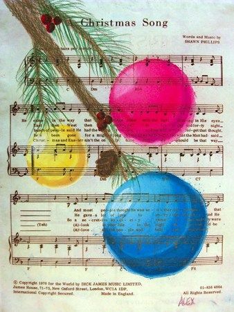 an old sheet music with christmas ornaments on it