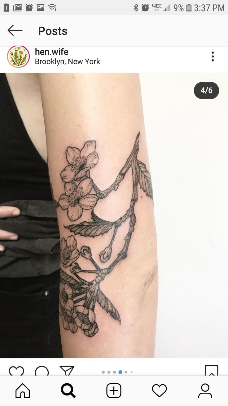 a woman's arm with flowers on it and the words, beautiful new york