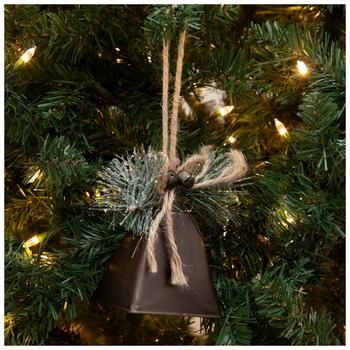 a bell ornament hanging from a christmas tree