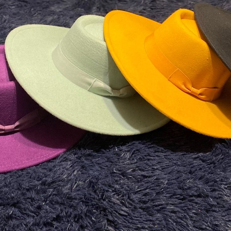 This Hat Comes In A Black, Mint, Mustard And Purple. Yellow Casual Fedora With Flat Brim, Casual Yellow Fedora With Flat Brim, Yellow Flat Brim Fedora Casual Style, Casual Yellow Wide Brim Hat, Casual Yellow Fedora With Short Brim, Casual Yellow Sun Hat With Flat Brim, Casual Yellow Flat Brim Sun Hat, Yellow Fedora With Short Brim For Spring, Yellow Fedora Hat For Fall