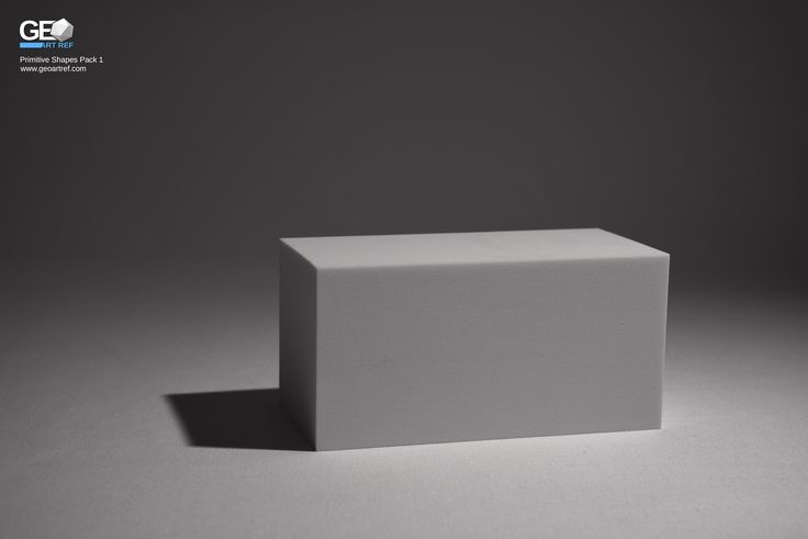 a white cube sitting on top of a table