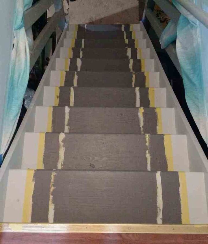 the stairs are painted gray and yellow