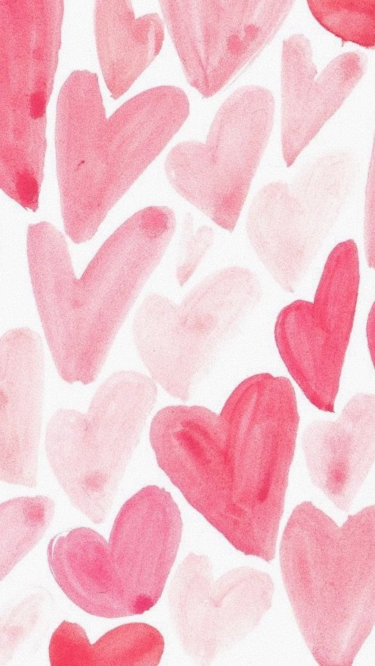 watercolor hearts on white paper with pink and red colors